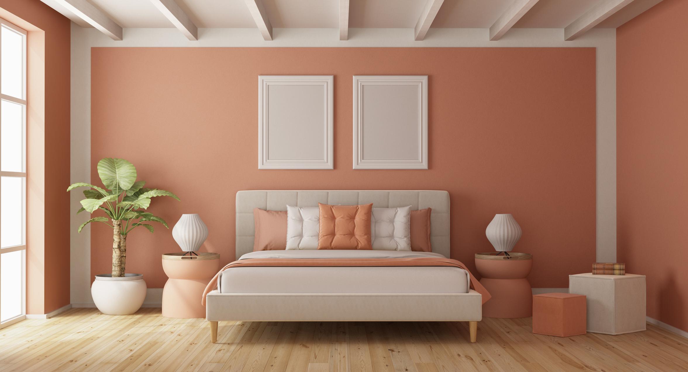 Une chambre avec un lit de couleur "Peach Fuzz"